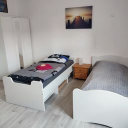 Schlafzimmer mit 3 Einzelbetten