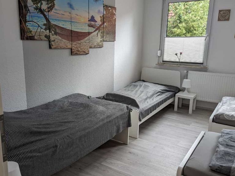 Schlafzimmer mit 3 Einzelbetten